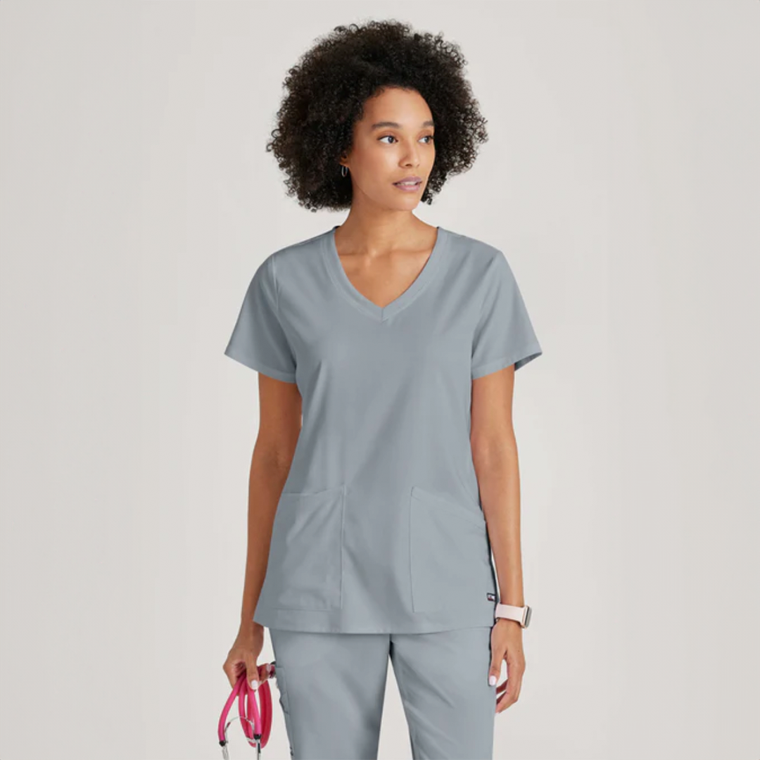 
                  
                    CAMISA DE MUJER ESTILO SERENA CUELLO V CURVO GREYS ANATOMY
                  
                