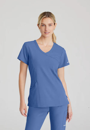 Color: Azul Cielo - vista frontal Camisa Mujer Cuello V Skechers en Medimed Honduras