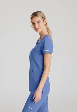 Color: Azul Cielo - vista posterior Camisa Mujer Cuello V Skechers en Medimed Honduras
