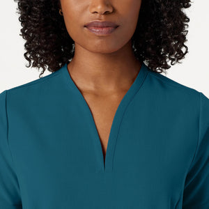 Color: Azul Caribe - detalle Camisa Jaanuu Calix Fit and Flare en Medimed Honduras