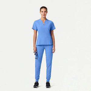 Color: Azul Cielo - vista lateral Camisa Jaanuu Calix Fit and Flare en Medimed Honduras