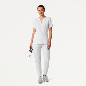 Color: Blanco - vista lateral Camisa Jaanuu Calix Fit and Flare en Medimed Honduras