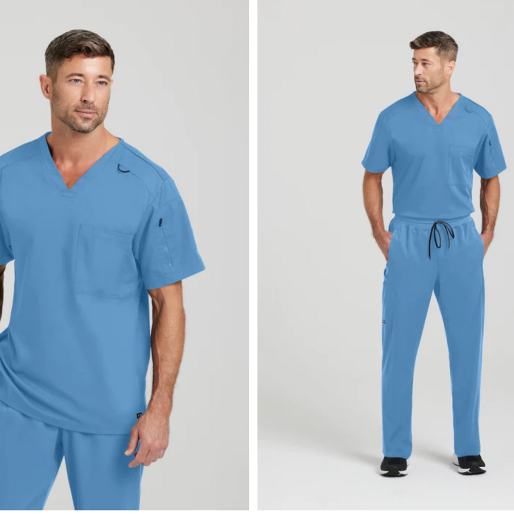 
                  
                    Camisa estilo Murphy de Grey's Anatomy, con cuello en V y 2 bolsillos, modelo GRST079, ideal para profesionales de la salud que buscan comodidad y funcionalidad.
                  
                