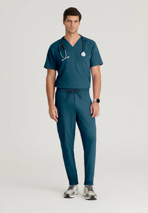 Color: Azul Caribe - vista lateral Camisa Greys Anatomy Murphy Hombre en Medimed Honduras