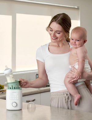 Momcozy Nutri: Calentador de Biberones 9 en 1 con Luz Nocturna, diseñado para proporcionar una solución versátil y conveniente para calentar biberones y alimentos para bebés. ¡Obtén un calentador multifuncional con luz nocturna integrada para facilitar las noches con tu bebé!