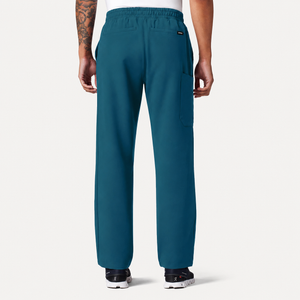 Color: Azul Caribe - vista detalle bolsillos Pantalón Jaanuu Rhodes en Medimed Honduras