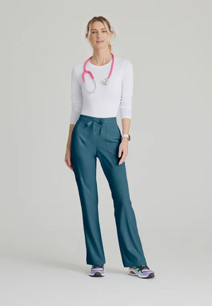 Color: Azul Caribe - vista lateral Pantalon Mujer 3 Bolsillos Skechers en Medimed Honduras