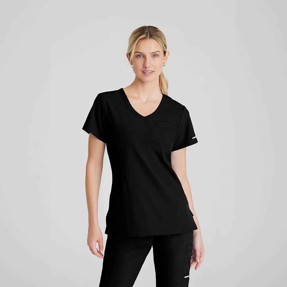 CAMISA DE MUJER  CUELLO V Y 3 BOLSILLOS SKECHERS