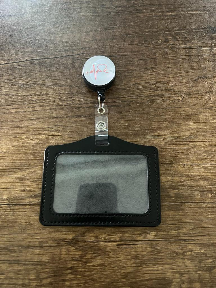 
                  
                    Porta Carnet con Figura Retráctil
                  
                