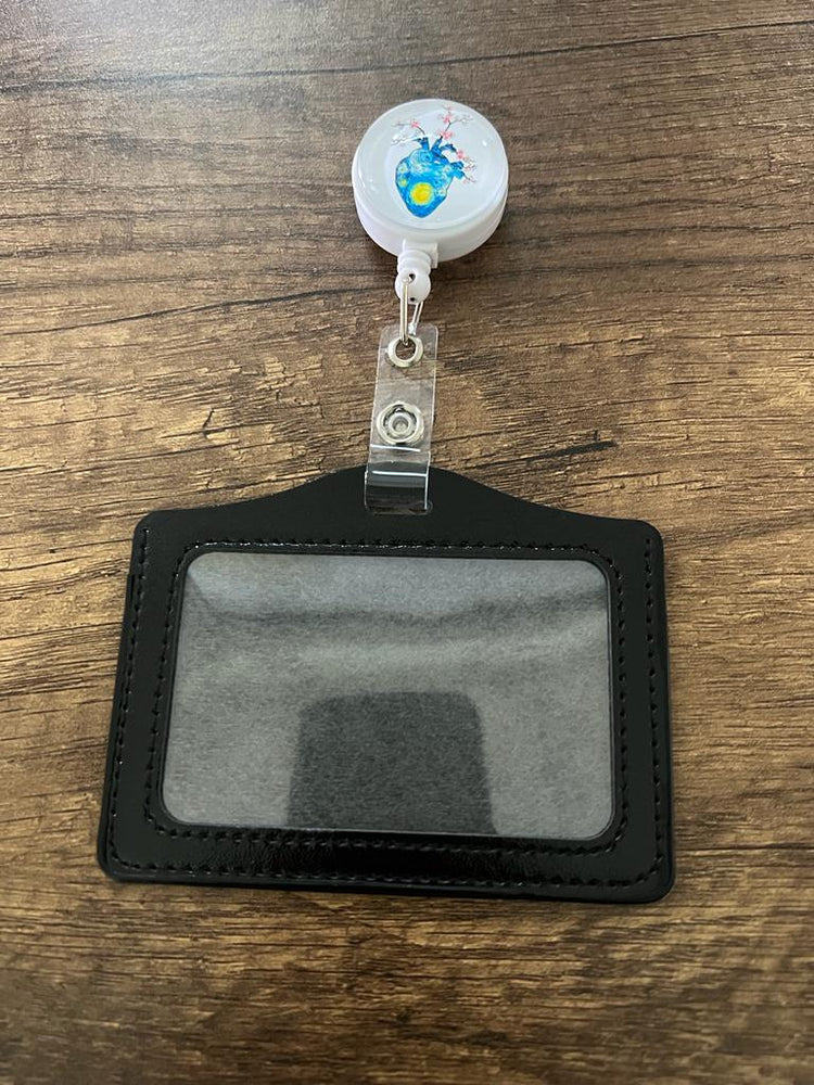 
                  
                    License Holder with Retractable Figure
                  
                