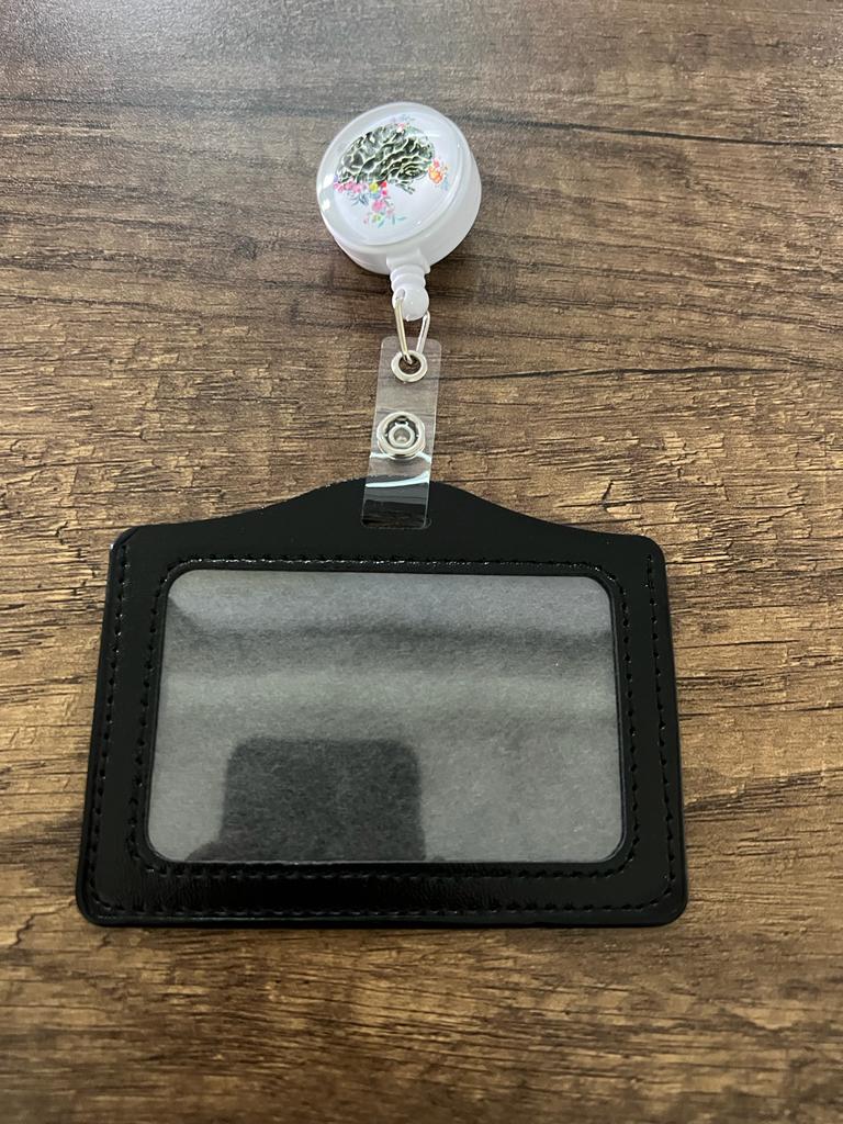 
                  
                    License Holder with Retractable Figure
                  
                