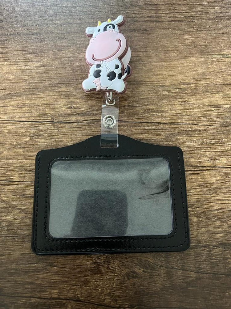 
                  
                    Porta Carnet con Figura Retráctil
                  
                
