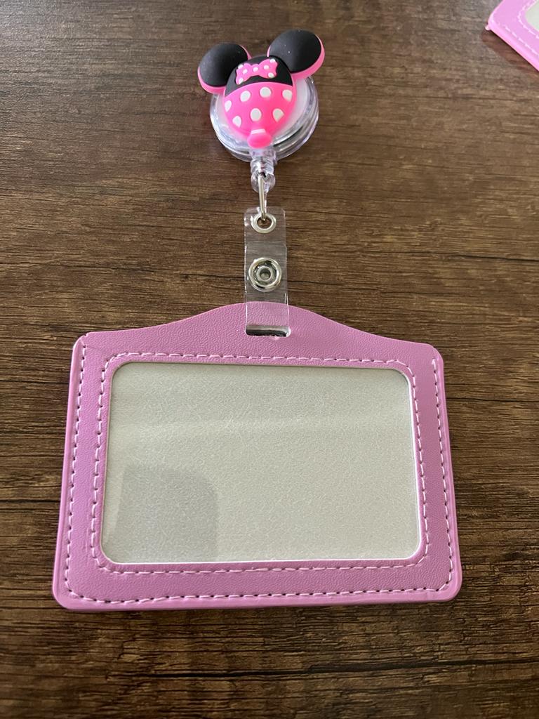 
                  
                    License Holder with Retractable Figure
                  
                