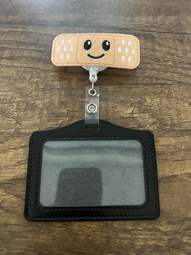 
                  
                    Porta Carnet con Figura Retráctil
                  
                