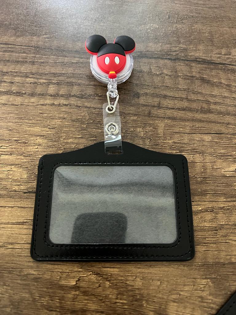 
                  
                    License Holder with Retractable Figure
                  
                