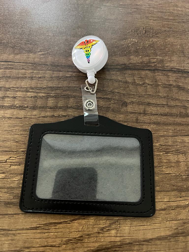 
                  
                    License Holder with Retractable Figure
                  
                