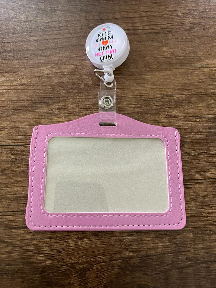 
                  
                    License Holder with Retractable Figure
                  
                