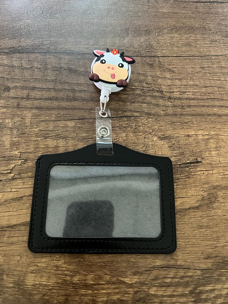 
                  
                    License Holder with Retractable Figure
                  
                