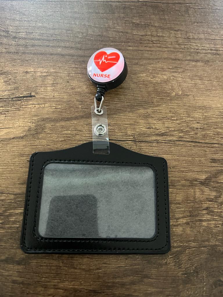 
                  
                    License Holder with Retractable Figure
                  
                