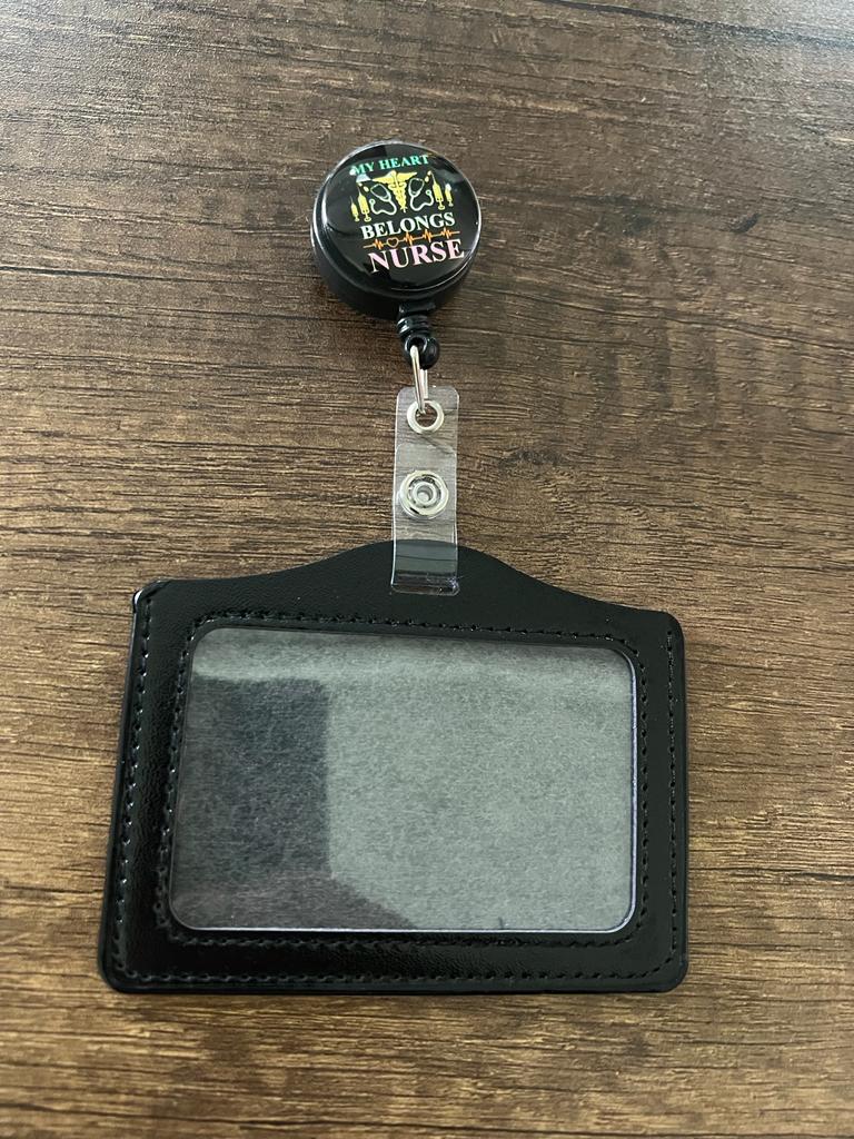 
                  
                    License Holder with Retractable Figure
                  
                