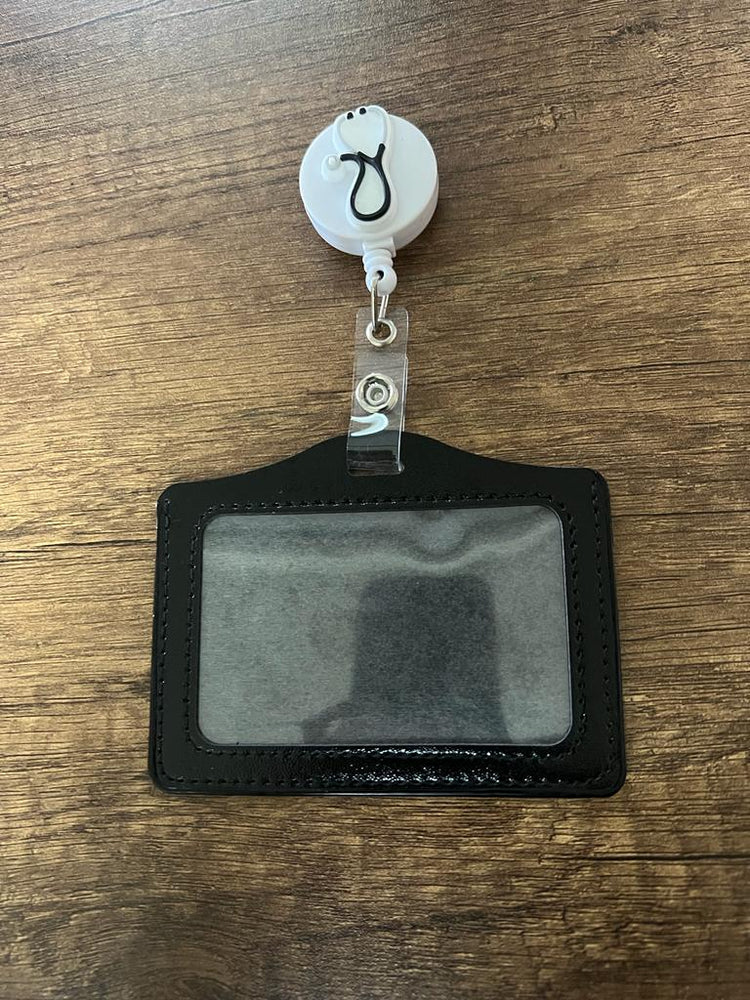 
                  
                    Porta Carnet con Figura Retráctil
                  
                